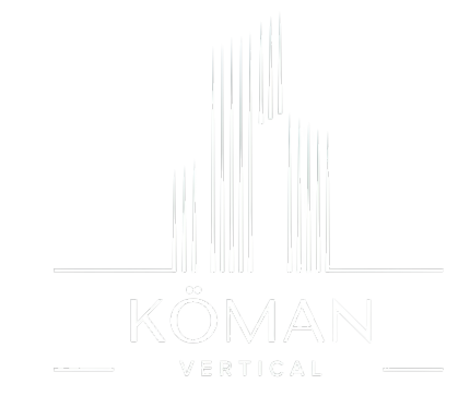 Komanvertical